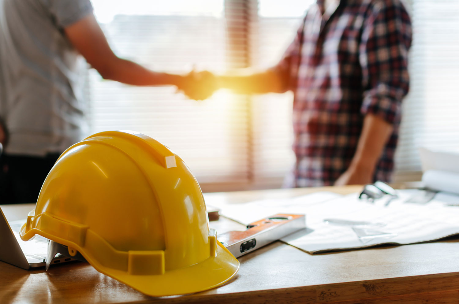 Construction Workers Shaking Hands